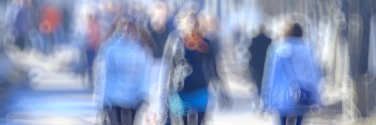 Blurry image of people walking